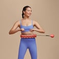 The Legit Benefits of Weighted Hula Hooping, and How to Get Started